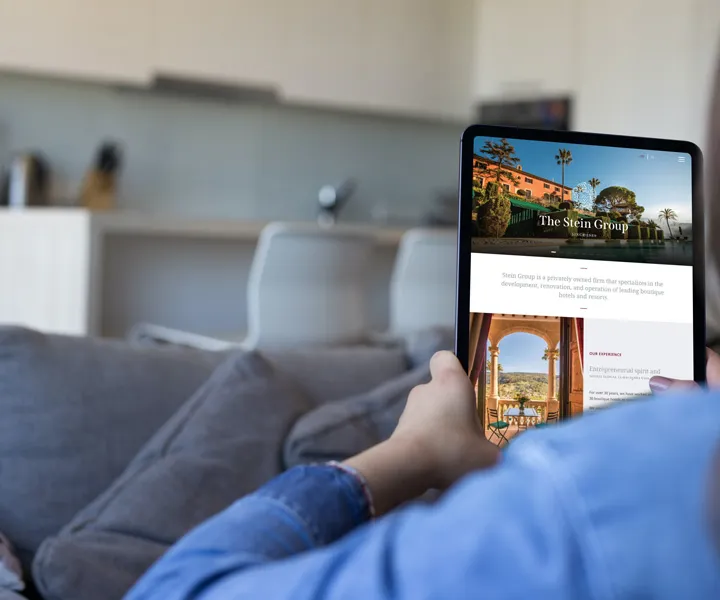 The stein group homepage tablet sofa mockup